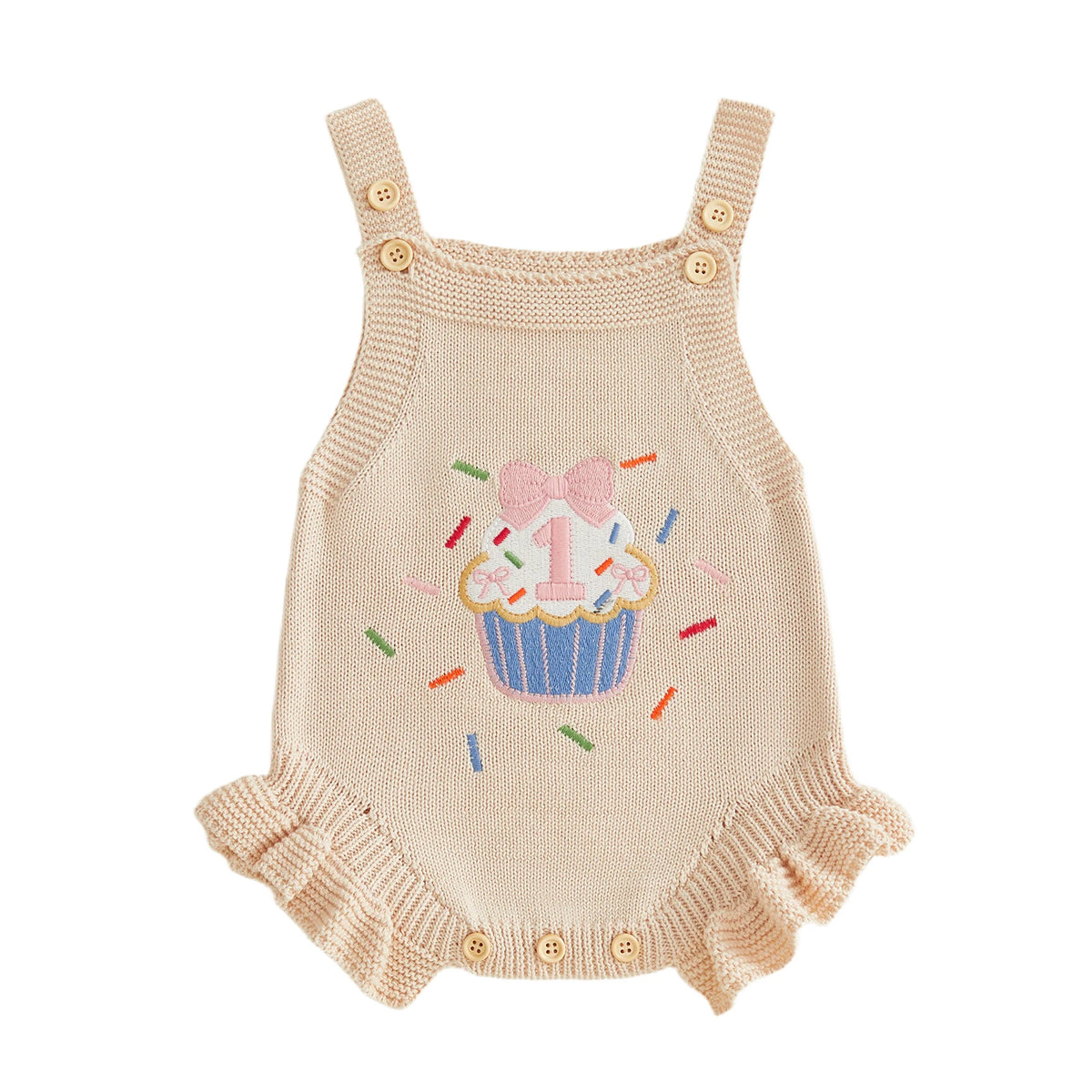 Beige knit romper overalls for baby girl with cupcake birthday embroidery and frilly leg cuffs.