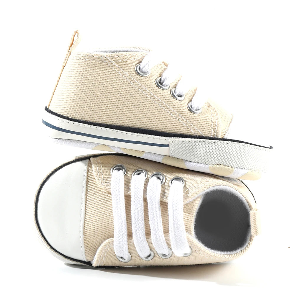 Baby's Canvas Soft-Sole Lace-up First Walkers in khaki, featuring a lightweight design with a breathable canvas upper and flexible cork sole, perfect for supporting baby's first steps.
