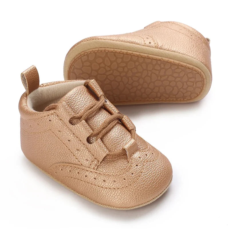 Baby Anti-Slip First Steps shoes in Regis Rich Gold color, ideal for stylish little ones starting to walk.