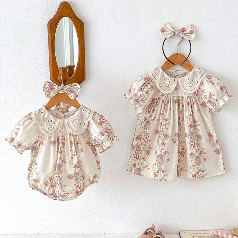 Vintage Outfits featuring a floral baby dress and a matching headband, perfect for little girls.