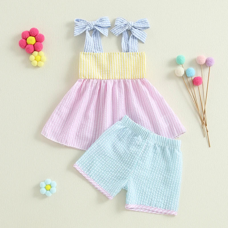 Sweet in Sun Seersucker 2 PC Shorts Set featuring a pink and yellow sundress with blue seersucker shorts, perfect for summer outings for girls aged 6 months to 4 years.