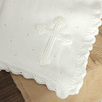 White cotton baptism blanket with crocheted cross, scalloped edge, lightweight 100 x 80 cm, soft knit.