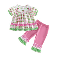 Frilly boho plaid 2-piece girls set with embroidered strawberry accents on puff-sleeve top and pink ruffle-hem pants