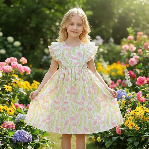 Mannequin wearing a floral dress with a decorative background featuring a logo and text.