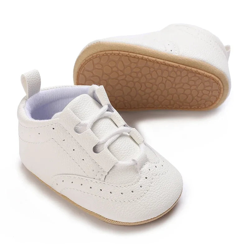 Baby Anti-Slip First Steps shoes featuring a durable rubber sole, perfect for providing excellent grip while walking.