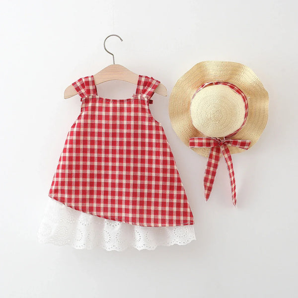 Red and white gingham party dress for toddlers with white lace trim and matching straw hat