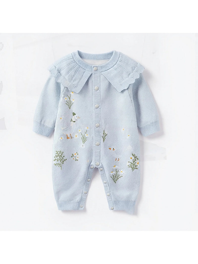 Boca Blue Fleurs Knit Long Sleeve Baby Romper featuring a delicate round collar and embroidered floral design, perfect for stylish baby girls aged 3 to 24 months.