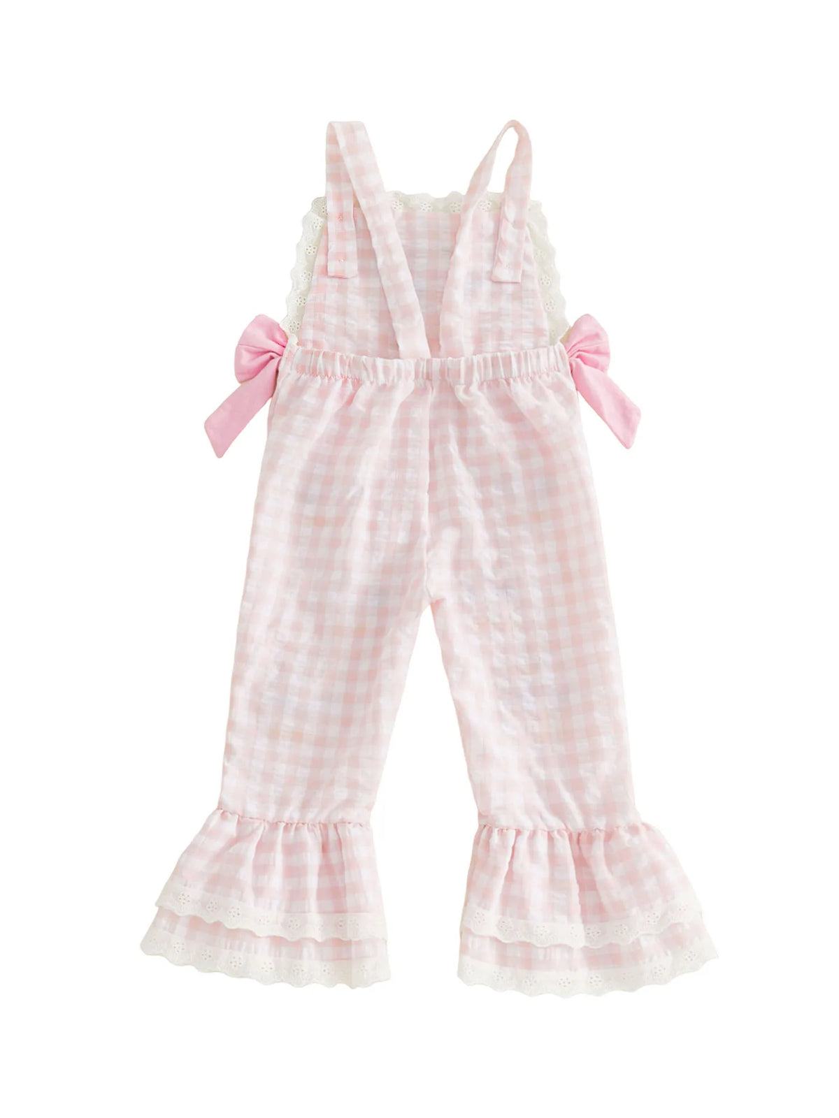 Pink checkered overalls with ruffled details on a white background