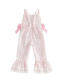 Pink checkered overalls with ruffled details on a white background