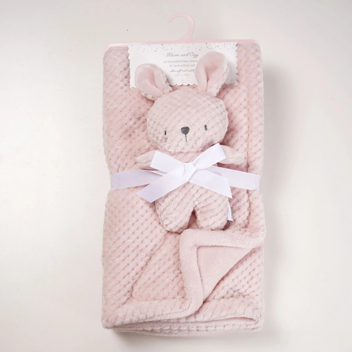Soft pink 2-piece baby blanket set with plush knit doll and white bow, cozy waffle-knit fabric