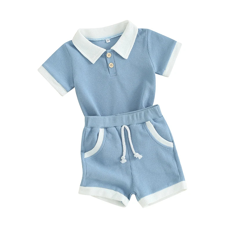 Ocean Breezes boys 2-piece polo set: light blue shirt with white collar and cuffs, matching shorts with drawstring.