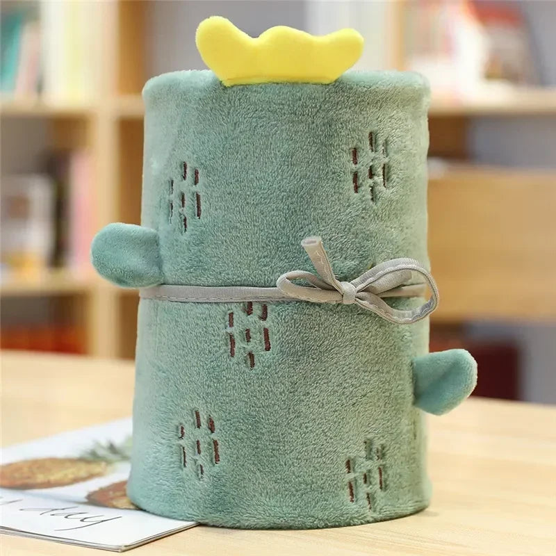 A delightful green Bath Time Cuties toddler bath towel rolled up, featuring a fun cactus design that adds a playful touch to bath time.
