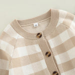 Close-up of the neckline of the Fallon Cozy Khaki Baby Knitted Romper, showing soft texture and button details, perfect for babies 0-24 months.