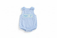 Blue checkered baby romper with 'MAMA'S BOY' text on a beige background
