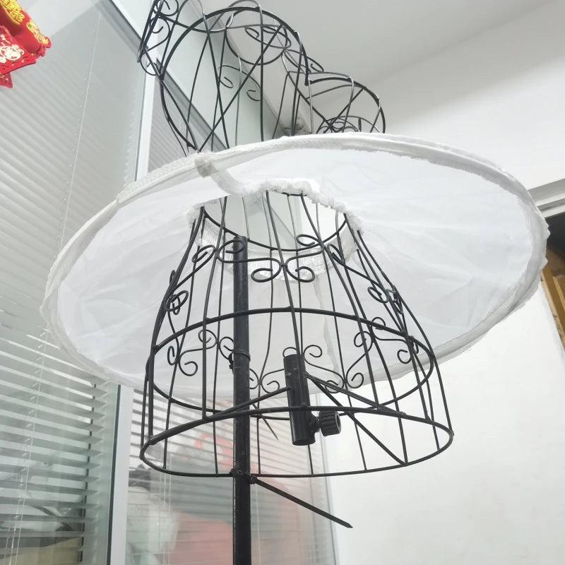 Girl's adjustable off-white short crinoline petticoat underskirt, polyester, on wire dress form.
