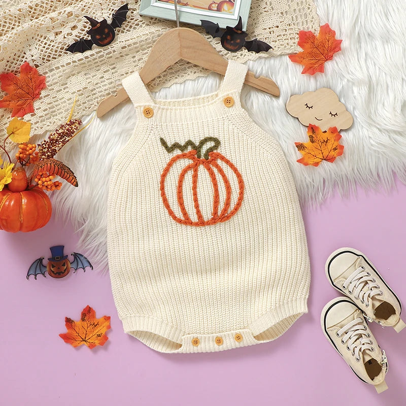 Pumpkin Embroidered Overalls Knit Baby Outfit on display - This knit baby outfit showcases a delightful pumpkin design, ideal for seasonal festivities.
