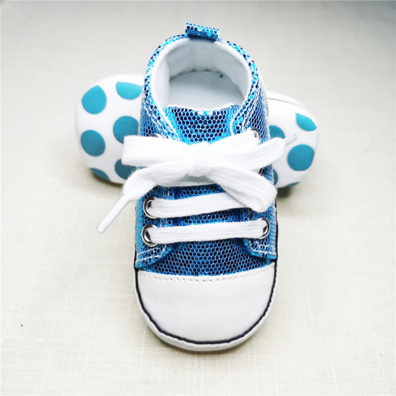 Adorable Baby's Canvas Lace-up First Walkers showcasing Shimmering Boca Blue color, designed for comfort and style for babies learning to walk.