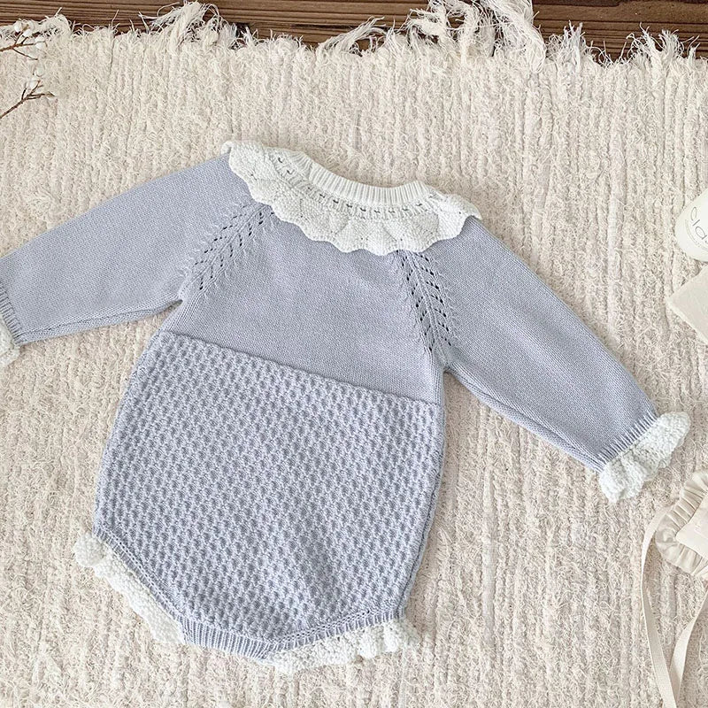 Back view of the Pretty In Knit Baby's Romper, highlighting the thoughtful design for easy diaper changes.