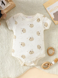 Little Bear beige 8-piece newborn romper set in white cotton with bear faces and clouds; snaps at the legs.