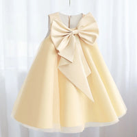 Cream-colored Sari-Elle dress with a large bow at the waist, elegant A-line party dress for girls aged 4–6.