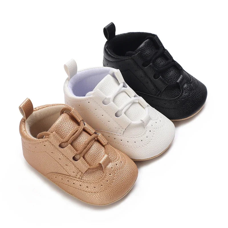 Baby Anti-Slip First Steps shoes in chic black color, designed for comfort and safety during early walking.
