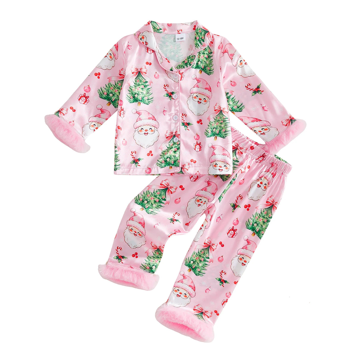 Pink girls Christmas pajama set with Santa, trees, and bow print. 2-piece satin loungewear with fuzzy cuffs for holiday wear.