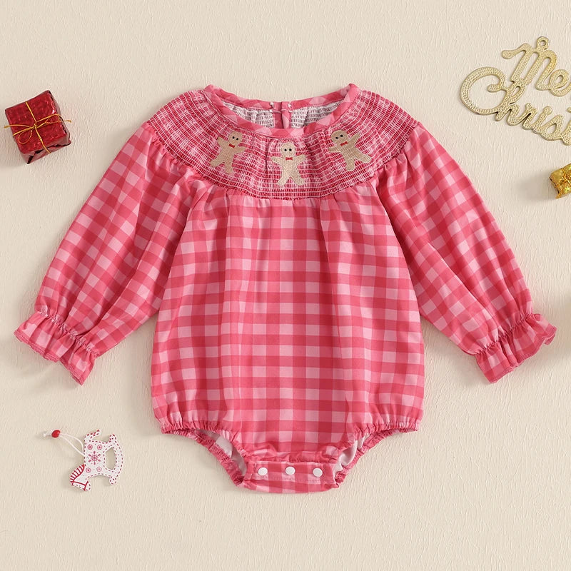 Pink gingham Holiday Cuteness Smocked Baby Bubble adorned with gingerbread men design, perfect for festive occasions.