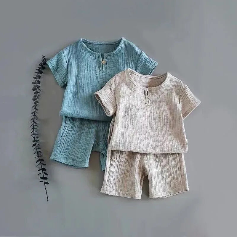 Lightweight Children's Cotton Linen Shorts Set in blue and beige, perfect for fashionable young adventurers.