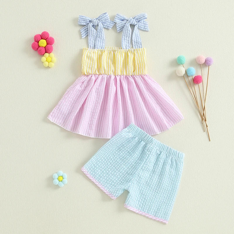 Sweet in Sun Seersucker 2 PC Shorts Set featuring a charming pink top with blue and yellow striped shoulder ties, paired with blue seersucker shorts.