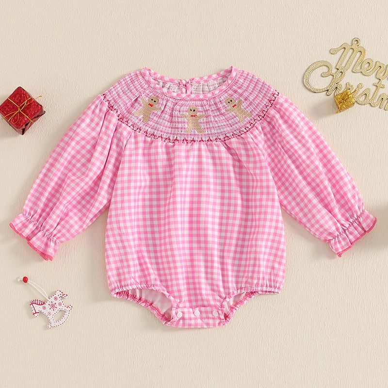 Holiday Cuteness Smocked Baby Bubbles in pink gingham adorned with gingerbread men, creating a charming look for baby during the holidays.
