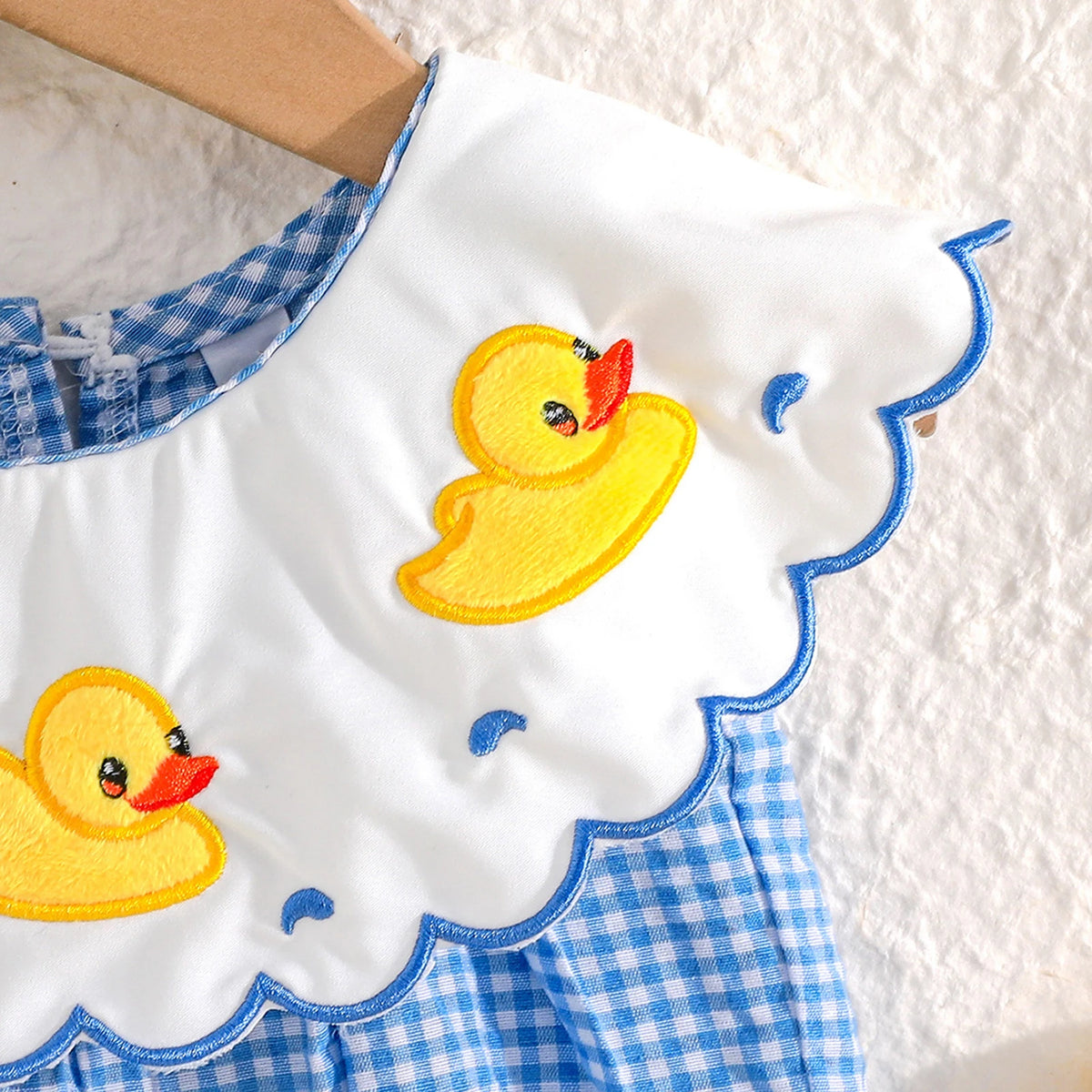 Plaid Duckies Baby Bubble Embroidered Collar: yellow duck embroidery on white fabric with blue gingham trim.