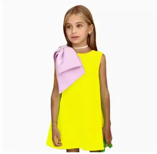 girls bright yellow sleeveless party dress with large pink bow detail aged 6 to 8 years