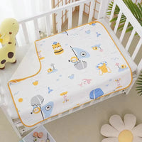 Childrens Waterproof Changing Pad in Cute Prints on a baby crib with yellow trim, cotton mat 50x70 cm or 70x90 cm