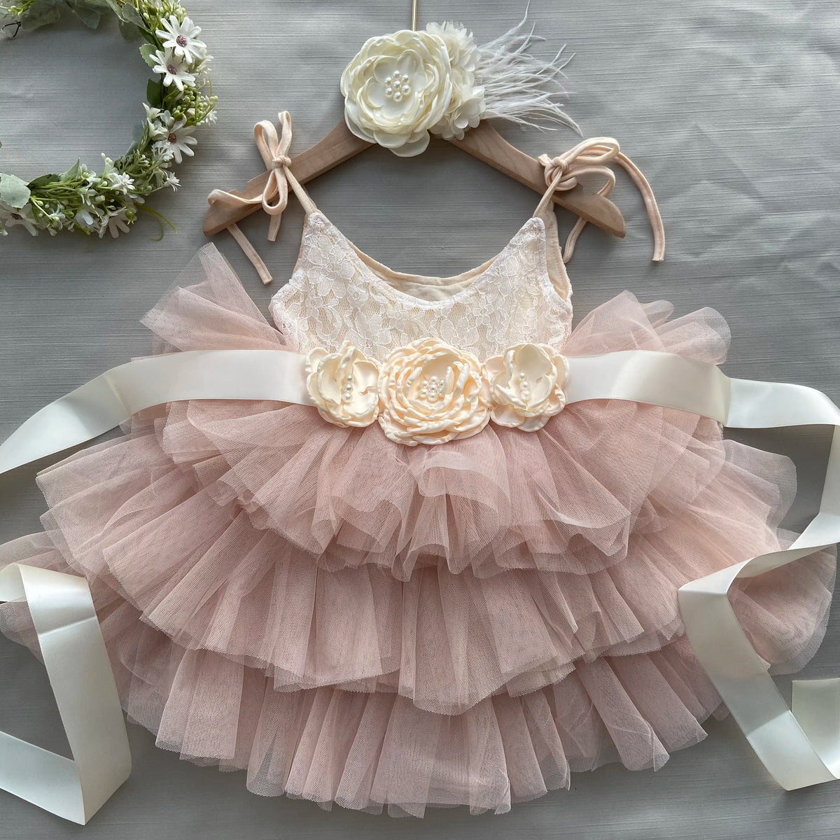 Cecilia tiered tulle dress with lace bodice and vintage belt and headband, pale pink layers.