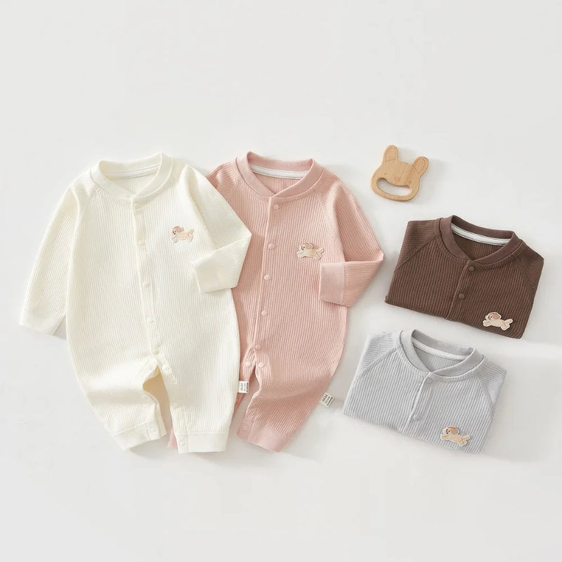 Here Doggie! Cute Baby Romper in four colors: cream, princess pink, trendy gray, and chocolate. Perfect cute baby romper for stylish infants.