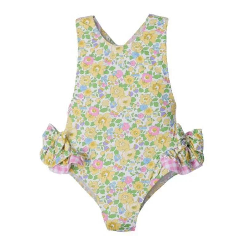 Bright yellow floral pattern on 'Little Hearts' Ruffled One Piece Girls Summer Swimsuit, designed for playful summer days.