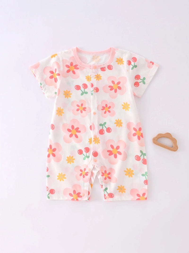 Frontal view of the Floral Baby! Romper Outfit, presenting its cheerful design for infants aged 1 month to 1 year. A stylish baby romper outfit for various occasions.