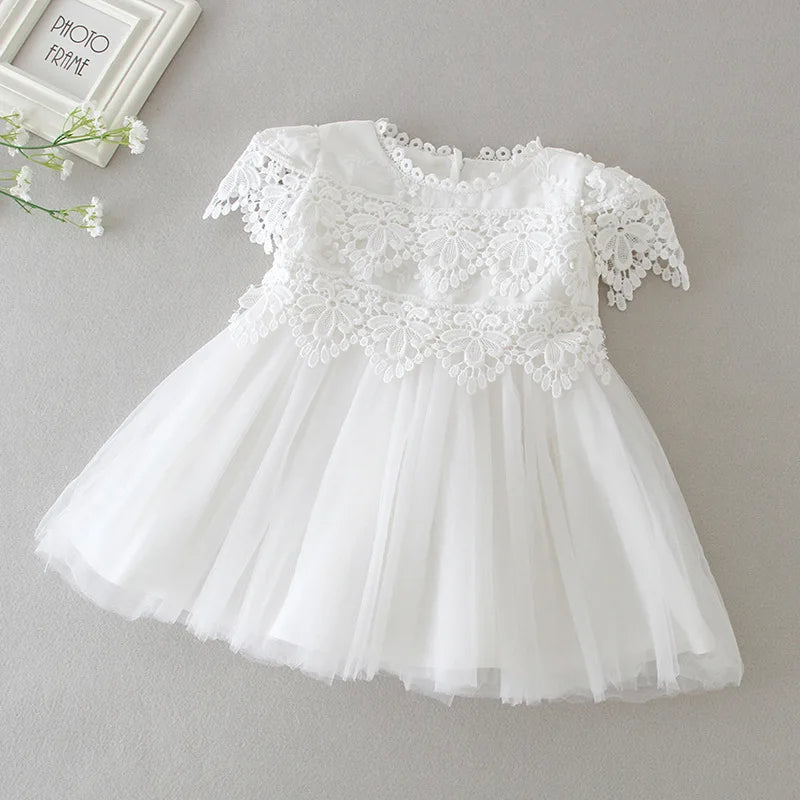 Beatrice Ann elegant white lace dress for little girls with appliqué bodice, lantern sleeves, full tulle skirt.