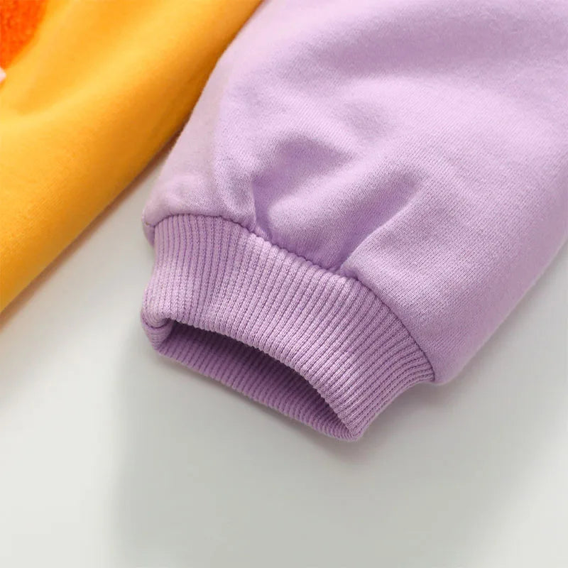 Detailed image of the colorful girls dress cuff, emphasizing the comfortable fit and stylish design.