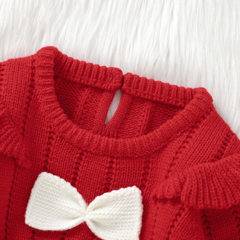 Close-up of the Bowtie Cutie Long Sleeve Knitted Bubble in Holiday Red highlighting the knitted texture and bowtie detail.