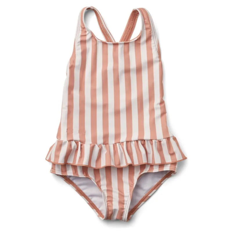 Pink-and-white striped sun-protective girls' one-piece swimsuit with frilly skirt and crisscross back straps.