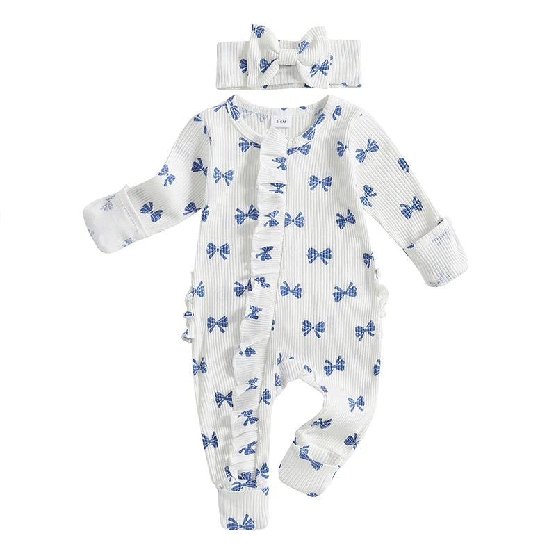 "Bow-tique" Baby Romper Set in white with blue bows and matching headband, featuring ruffle details and front zipper for easy dressing.