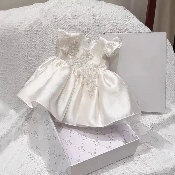 Astrid satin flutter-sleeve princess dress, white with roundneck beaded bodice, zip back, ruched skirt.