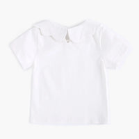A white short-sleeve baby top with a wide, scalloped Peter Pan collar, shown flat against a light off-white background.