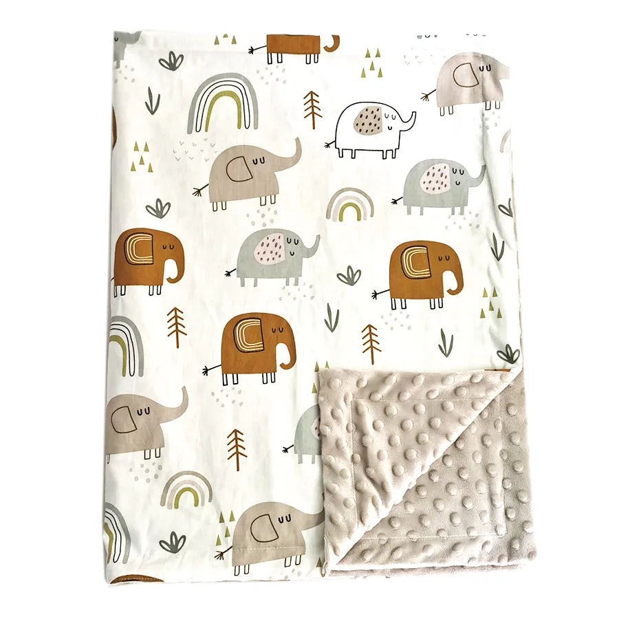 Soft baby blanket with cute elephant, rainbow, and tree print. Features cozy minky dot back. Durable blend perfect for nursery, stroller, or gifts.