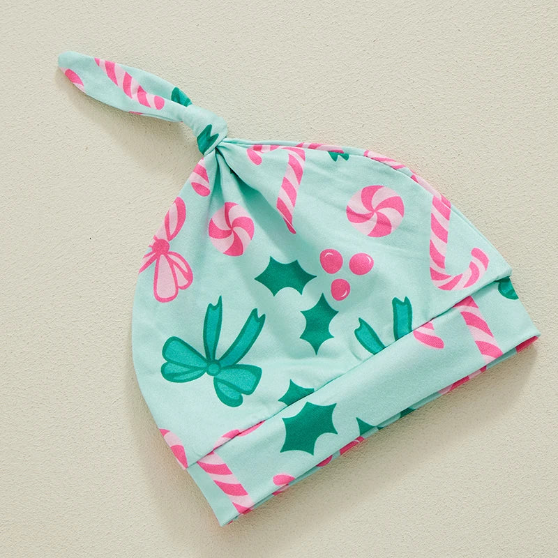 Close-up of the matching hat from the Candy Cane Sweetie Sleeper Swaddle Gown & Hat set, featuring a festive print, perfect for keeping newborns warm, highlighting the baby swaddle gown theme.