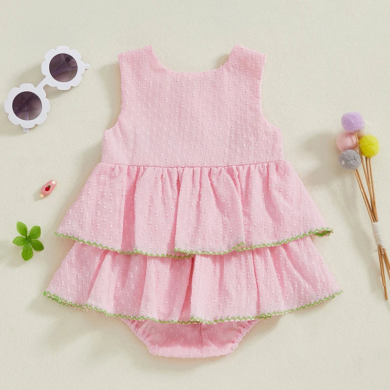 Cute 'Summer Cutie' Baby Summer Romper, designed with a playful pink tiered skirt and unique embroidery, perfect for sunny days.