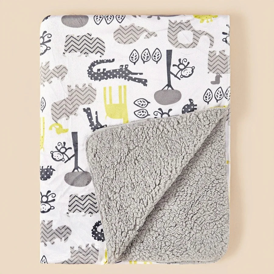 Lightweight ultra-soft children's micro-plush reversible blanket with colorful animal prints and gray sherpa reverse.