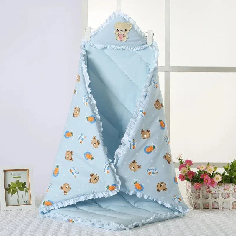 Delightful pink 'Animal Cutie' baby swaddle wrap adorned with cute animal prints, perfect for keeping your baby cozy.