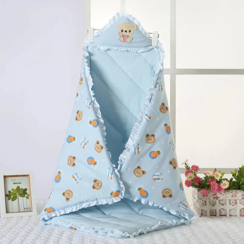 Delightful pink 'Animal Cutie' baby swaddle wrap adorned with cute animal prints, perfect for keeping your baby cozy.